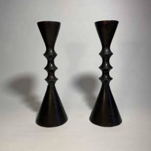 A Pair of Bronze Candlesticks